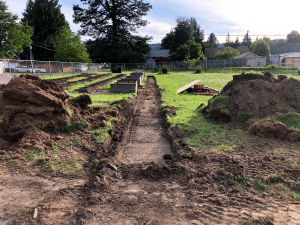 Sitton Elementarylow shot of trench cut for ADA path